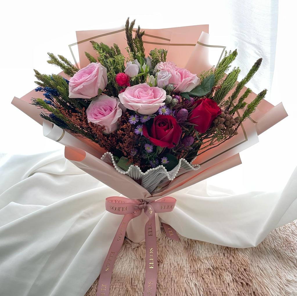 Fresh and Unique Roses Bouquet with natural christmas vibes flowers under $80 in Singapore Free Delivery